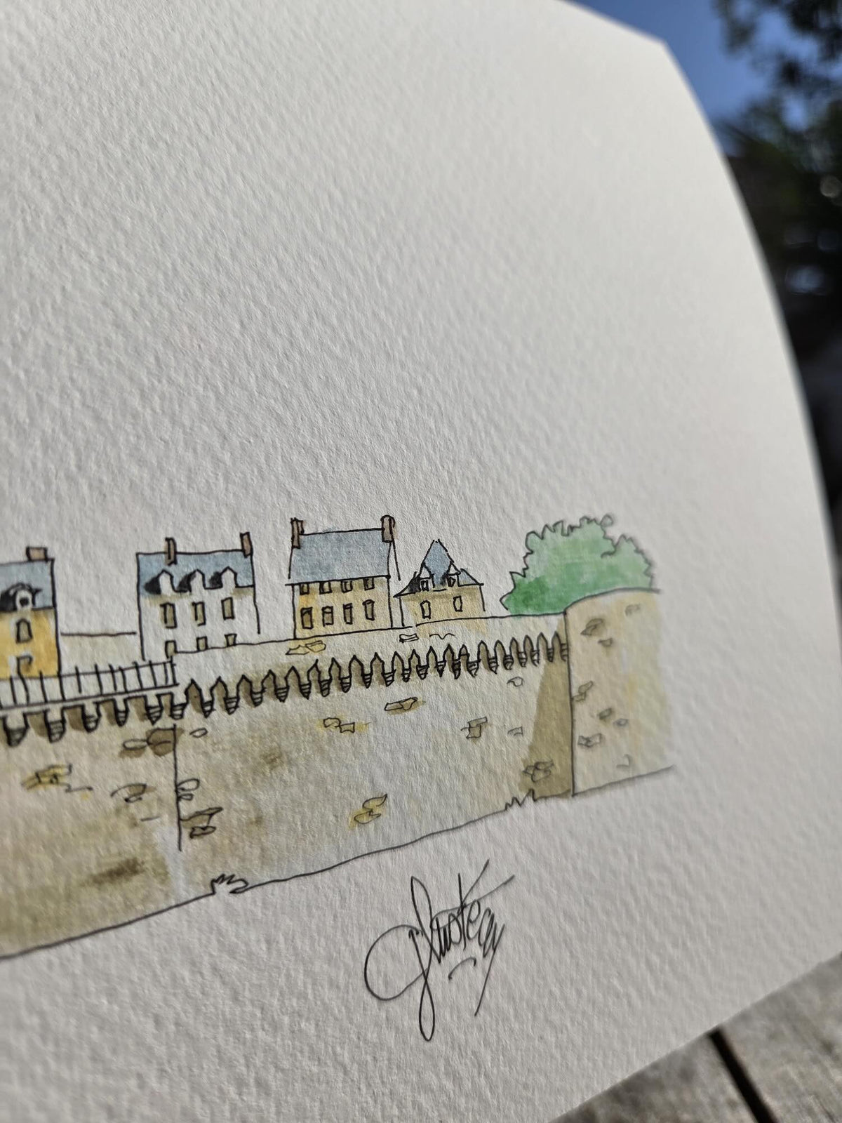 Signature de Gérard Lusteau sur l’aquarelle représentant les remparts de Vannes