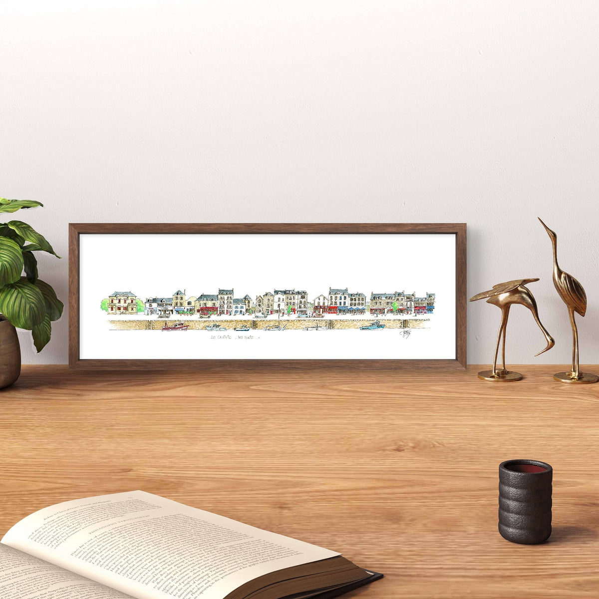Tableau des quais du Croisic présenté dans un intérieur